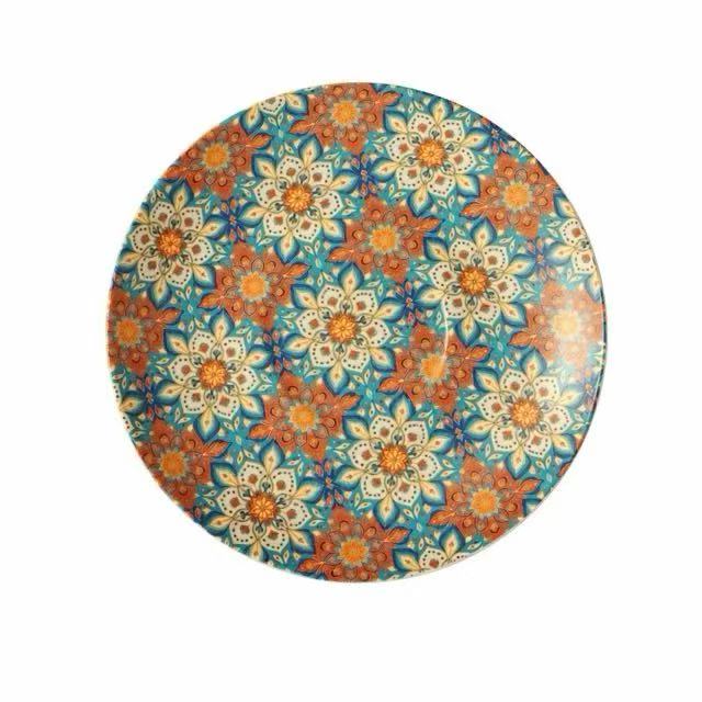 Taza de café de cerámica floral con platillo