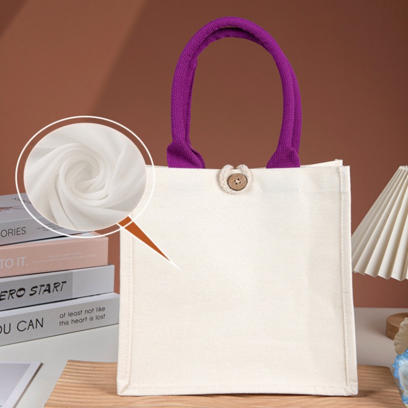 Bolso tote de lona con asa en contraste y botón de madera