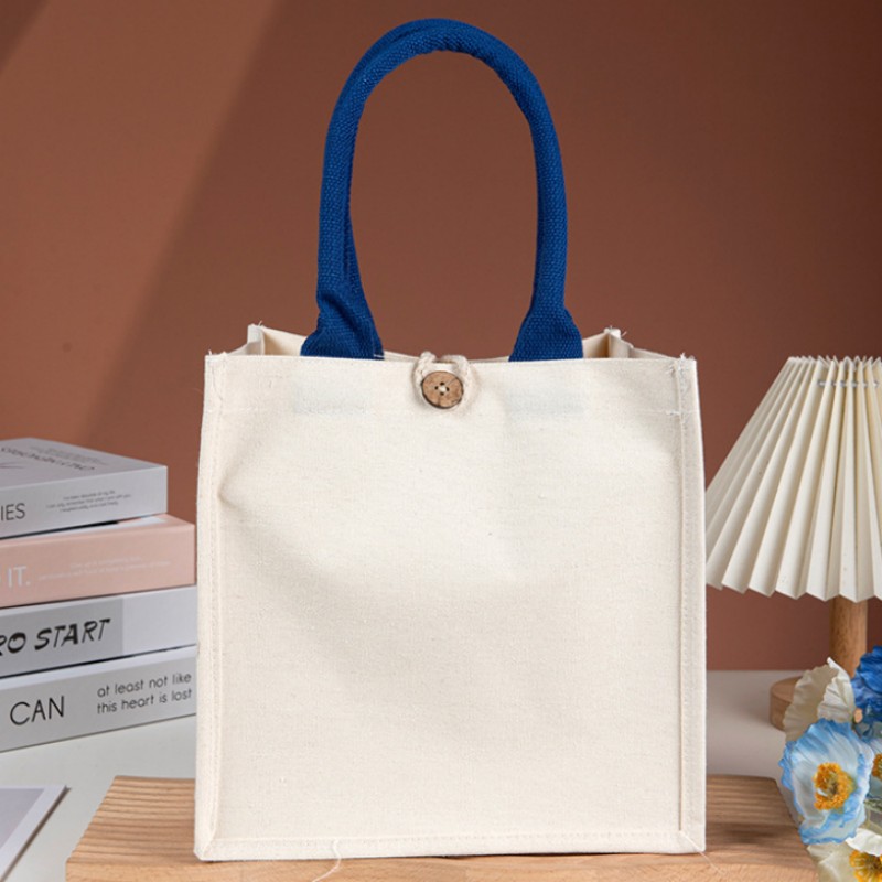 Bolso tote de lona con asa en contraste y botón de madera