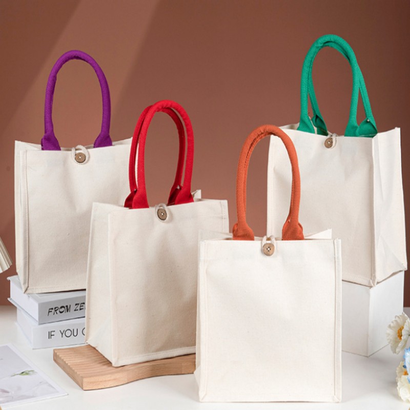 Bolso tote de lona con asa en contraste y botón de madera