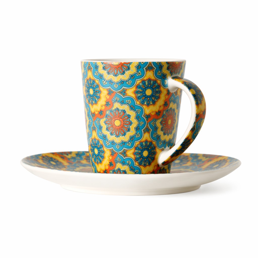 Taza de café de cerámica floral con platillo