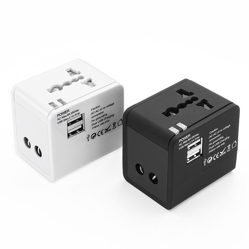 Adaptador de viaje universal con dos puertos USB