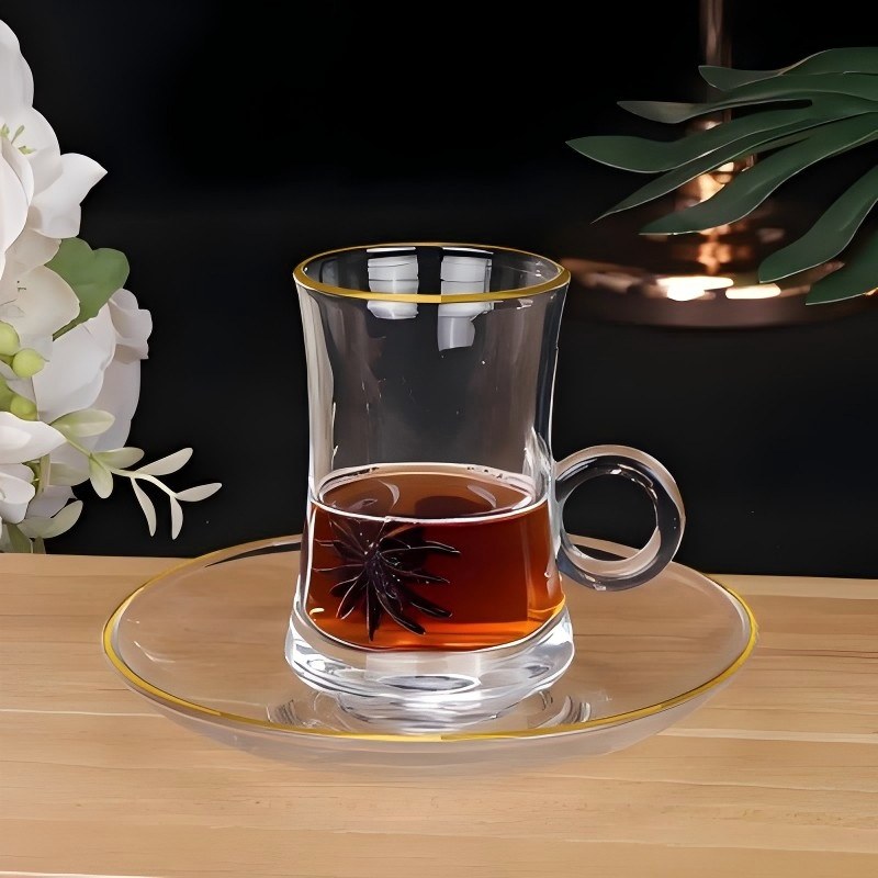 Taza de té de vidrio con mango de anillo impreso vintage